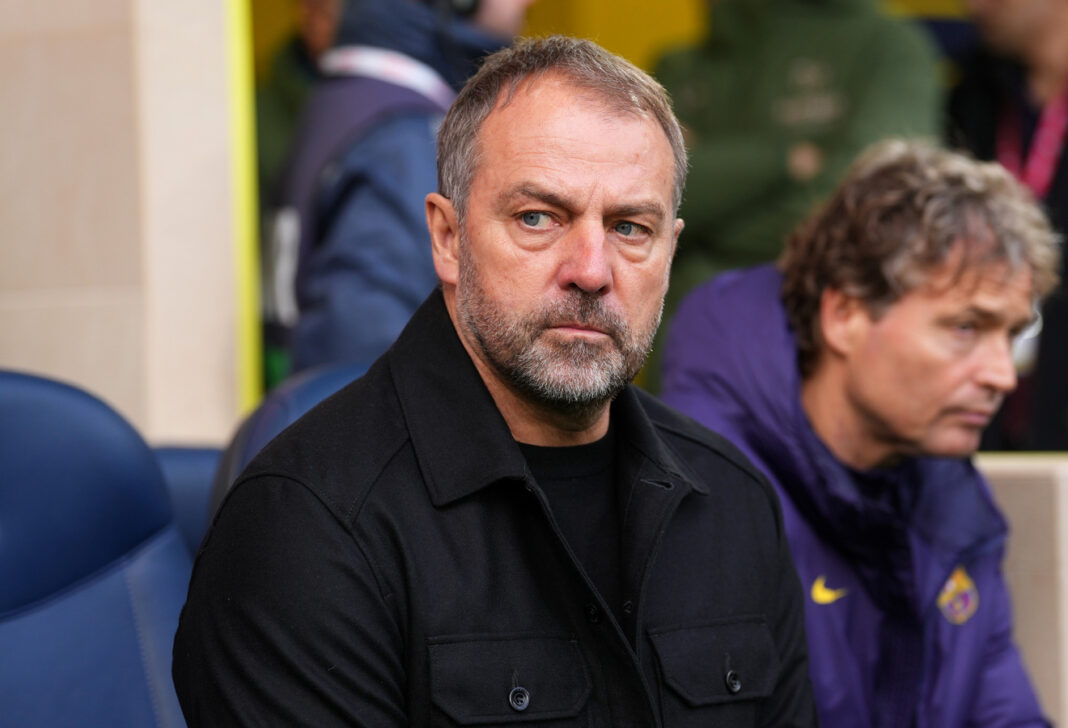 FC Barcelona manager Hansi Flick during a match at Camp Nou, symbolizing the club's push for a contract extension until 2028 and his tactical revitalisation of the squad.