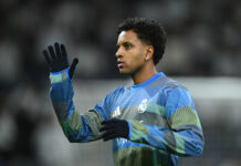 Real Madrid Rejects Massive €80m Manchester City Offer For Forward: Did Perez Make The Right Call? Rodrygo Goes in action for Real Madrid during a match at the Santiago Bernabéu stadium.